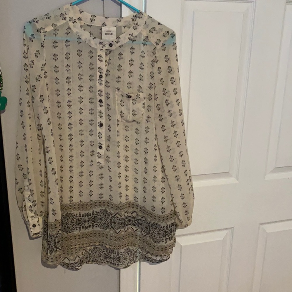 Women’s long sleeved button up shirt